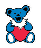 Blue bear with a red heart on a white background