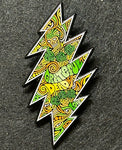 Colorful geometric pin on a dark textured background