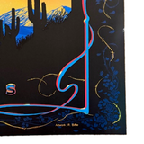 Decorative border with cacti, barbed wire, and floral elements on a black background.