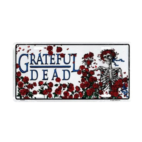 Rectangular metal sign with 'Grateful Dead' logo, skeleton, and red roses on a white background