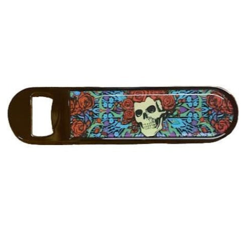 Bottle opener with skull and floral design on a white background