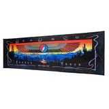 Sticker with a colorful design featuring an eagle and cacti on a textured surface