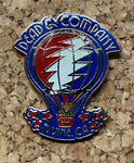 Colorful enamel pin featuring a hot air balloon design with ’Dead Company’ text and a lightning bolt motif.