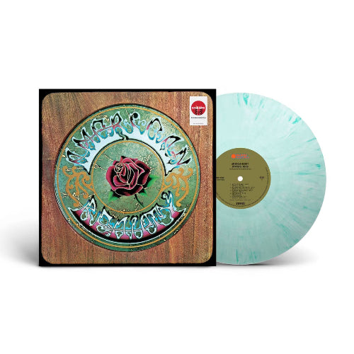 Vinyl record with a rose design on the cover and a light blue disc.