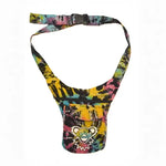 Colorful tie-dye fanny pack with a cartoon bear logo.