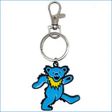 Blue bear keychain with yellow necktie on a white background