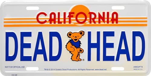 California license plate featuring the text ’DEAD HEAD’ and a dancing bear logo.