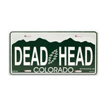 License plate with 'DEAD HEAD COLORADO' text on a green background