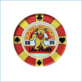 A circular replica poker chip designed to look like a Las Vegas craps chip, featuring the 'Luck of the Caesars' bear graphic and 'Las Vegas' text, displayed on a textured brown cardboard background.