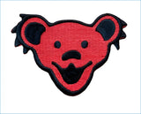 Red and black embroidered patch featuring the iconic grateful dead bear head design.