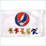 White flag featuring the iconic grateful dead skull logo in red, blue, and white within a circle, with five colorful dancing bears below it.