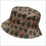 Beige bucket hat adorned with a repeating pattern of green turtles in various poses.