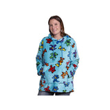 Woman wearing a blue hoodie with colorful bear patterns on a white background