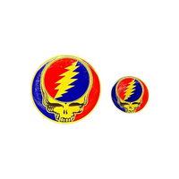 Two Grateful Dead logo pins on a textured gray background