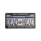 License plate with 'DEAD HEAD' and 'Have A Grateful Day!' text on a white background