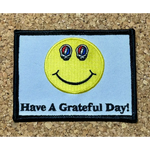 Embroidered ’Have A Grateful Day!’ patch.