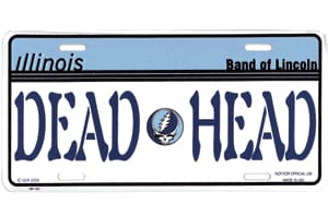 Novelty license plate with ’DEAD HEAD’ text and a Grateful Dead logo.