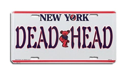 New York license plate with ’DEAD HEAD’ text and a red dancing bear logo.