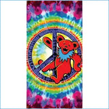 Vibrant grateful dead tie dye beach towel with red bear inside peace symbol and swirling rainbow patterns