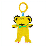 Yellow plush toy with a clip on a white background
