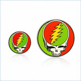Two circular enamel pins featuring the iconic grateful dead skull and lightning bolt design, one larger than the other.