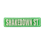 Embroidered patch with 'SHAKEDOWN ST' text on a dark background