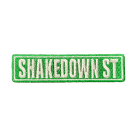 Embroidered patch with 'SHAKEDOWN ST' text on a dark background