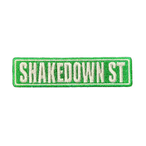 Embroidered patch with 'SHAKEDOWN ST' text on a dark background