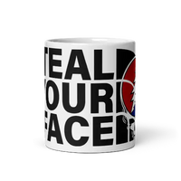 White mug with ’Steal Your Face’ design.