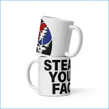 White ceramic mug featuring a bold black, red, and blue grateful dead skull logo with lightning bolt design.