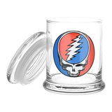Clear glass jar with a matching lid, featuring the iconic red and blue grateful dead skull logo on its side.