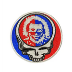 Circular patch with a skull design in red, white, and blue on a dark background