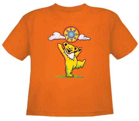 Orange t-shirt featuring a cartoon yellow bear balancing a colorful ball.