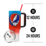 Insulated travel mug with a Grateful Dead ’Steal Your Face’ logo and red-blue gradient design.