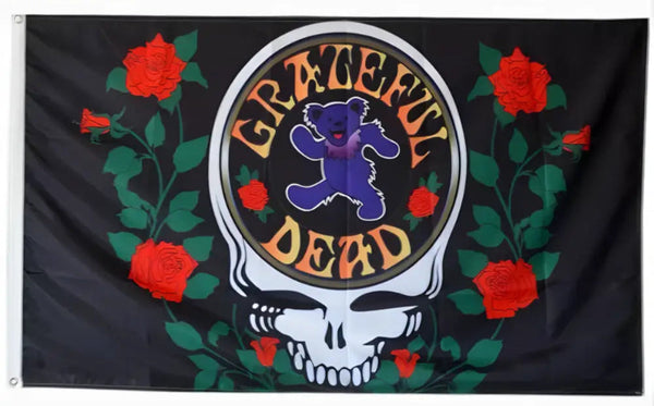 Grateful Dead logo flag featuring a skull with roses and dancing bear design.