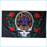 Black flag featuring the iconic grateful dead logo with a purple bear, white skull, and red roses on green stems.