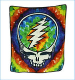 A vibrant tie-dye throw blanket featuring the iconic grateful dead skull and lightning bolt logo in white, set against a swirling background of blue, green, orange, and yellow hues.
