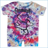 A short-sleeve baby romper featuring a Grateful Dead tie-dye pattern with a black outline of the Grateful Dead Bear and the Grateful Dead logo on the chest, shown against a plain white background.