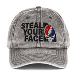 Gray denim cap with 'Steal Your Face' design on a white background