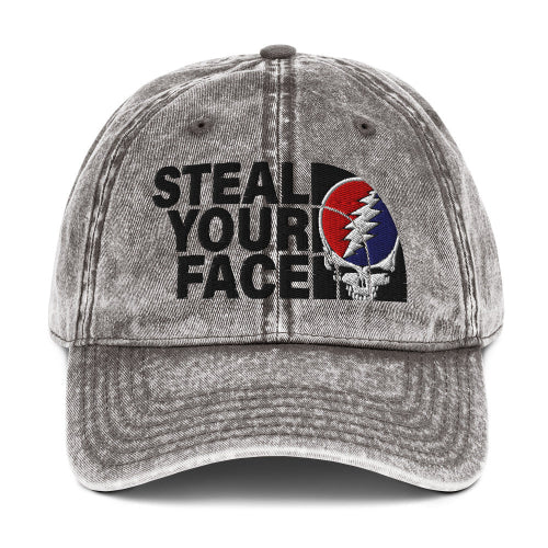 Gray denim cap with 'Steal Your Face' design on a white background