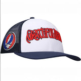 White and navy blue mesh trucker hat with red Grateful Dead text and Steal Your Face logo.