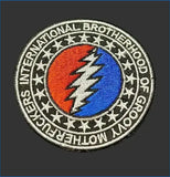 Circular embroidered patch featuring the iconic red and blue lightning bolt design of the grateful dead, surrounded by a black border with white stars and text reading ’international brotherhood of groovy mother fuckers.’