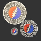 Set of three embroidered patches featuring the iconic grateful dead lightning bolt design in red, orange, and blue with white star borders.