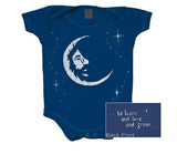 Blue baby onesie with a crescent moon and stars design on the front.