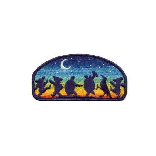 Embroidered patch with silhouettes of people dancing under a starry sky.