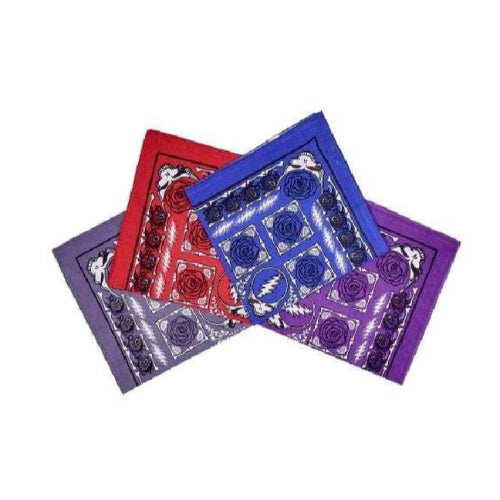 Three colorful playing card boxes stacked on a white background
