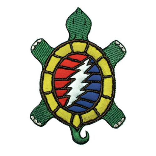 Colorful turtle-shaped patch with a lightning bolt design on a white background